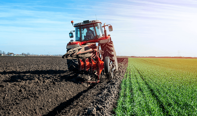 Tractor plowing agricultural field